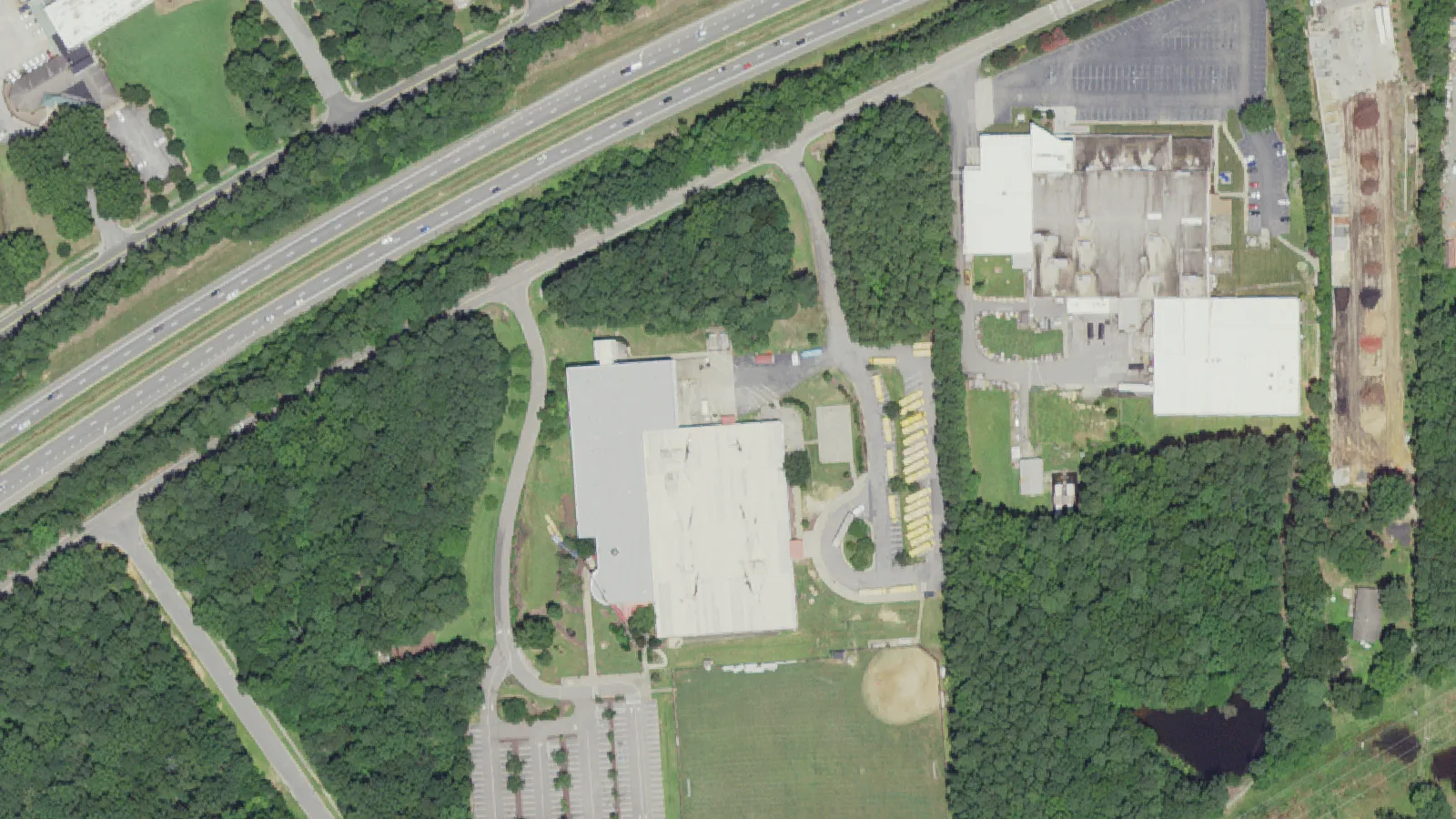 Lufkin Road Middle School, its bus lot and ball fields in Apex, seen from the air.
