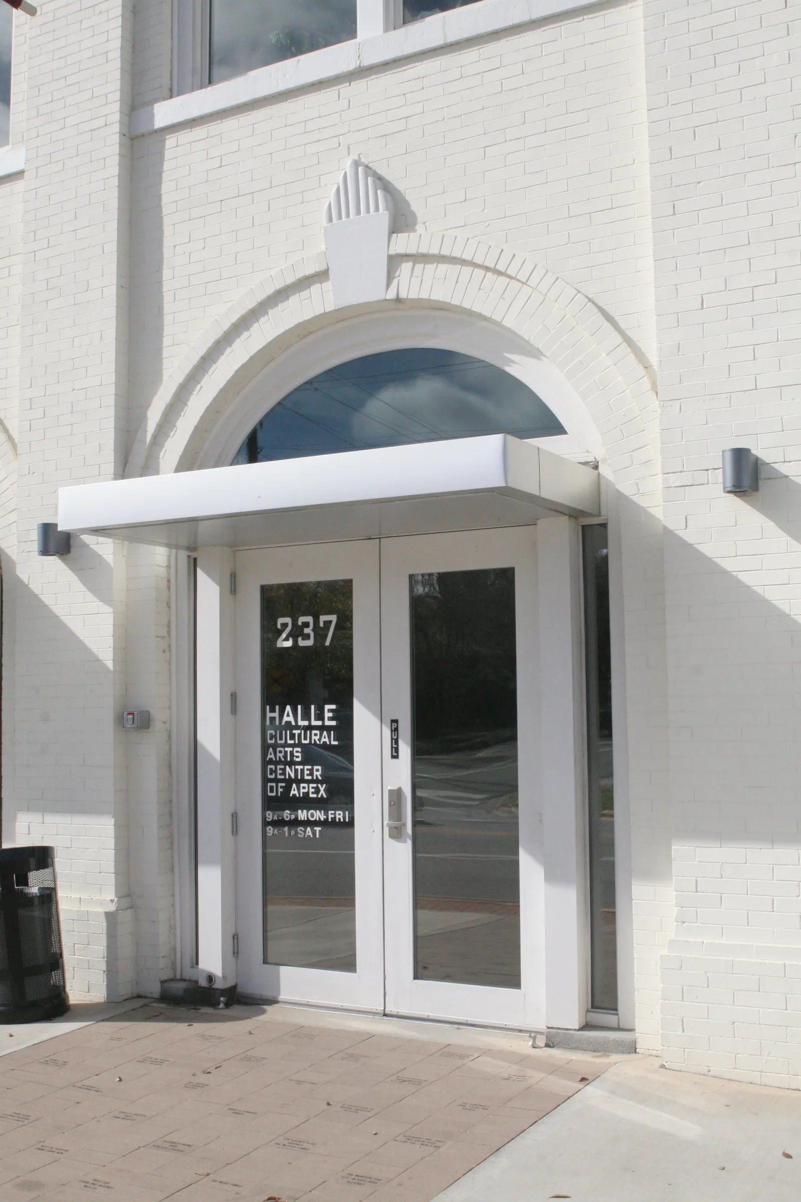 The arched entrance of the 1912 former Apex Town Hall, now The Halle Cultural Arts Center, on North Salem Street.