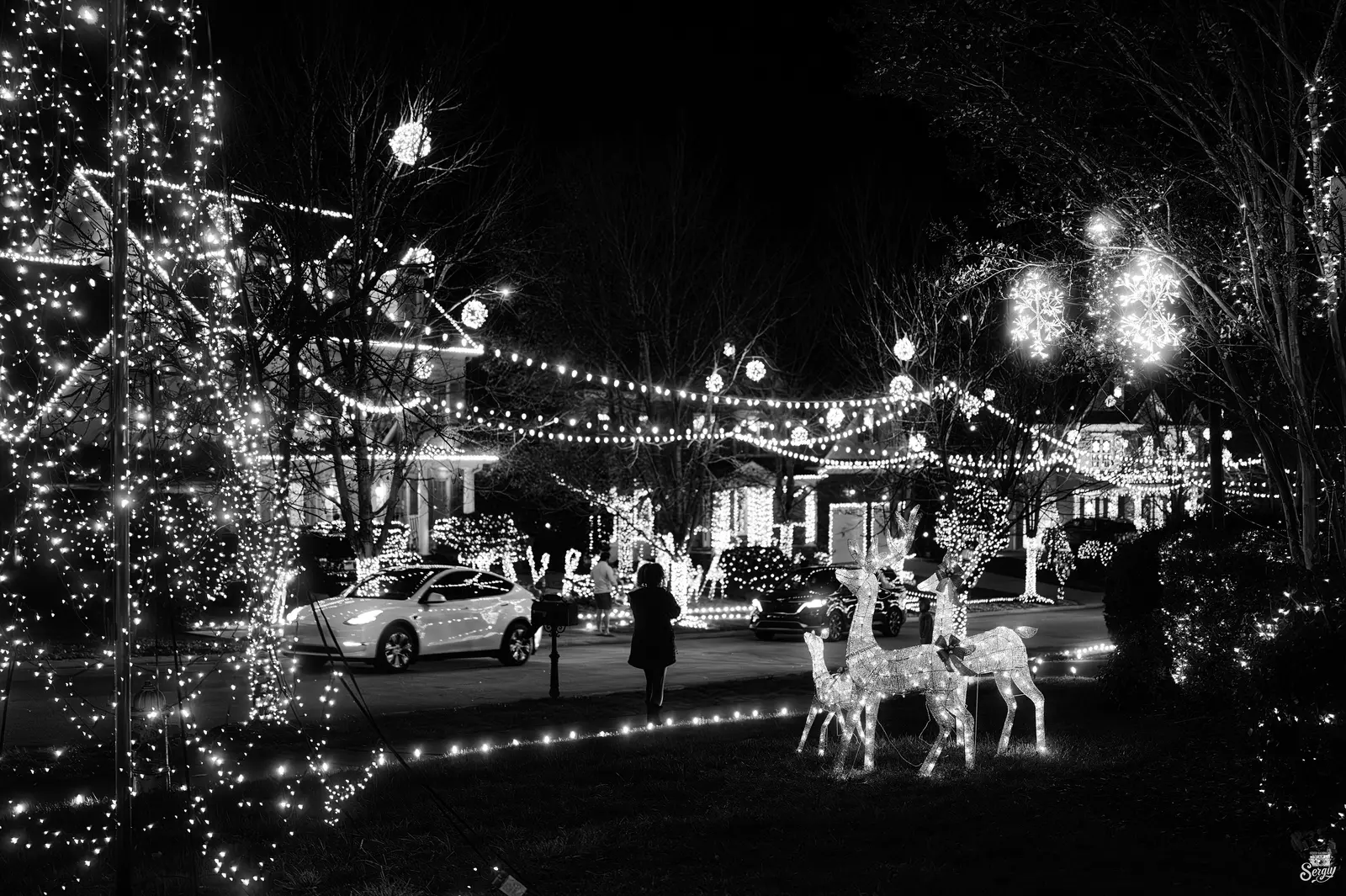 Christmas lights and decorations line a street in Raleigh, the state capital northeast of Apex.