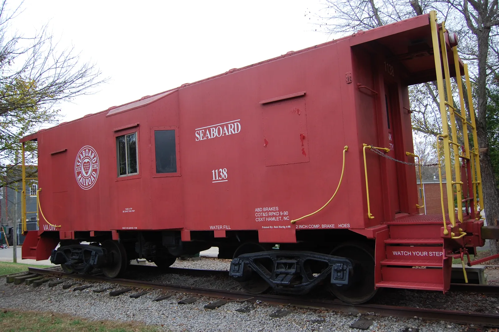 The red Seaboard caboose beside the Apex Union Depot on North Salem Street, a gift of the Apex Historical Society.