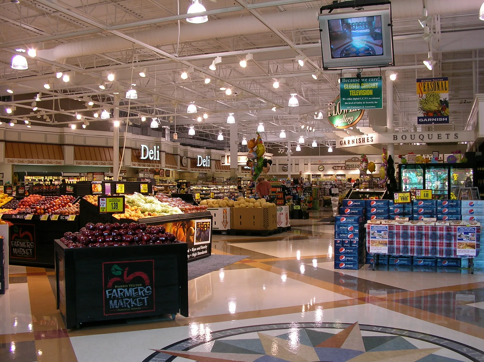 The produce section and deli inside the Harris Teeter grocery store in Apex.