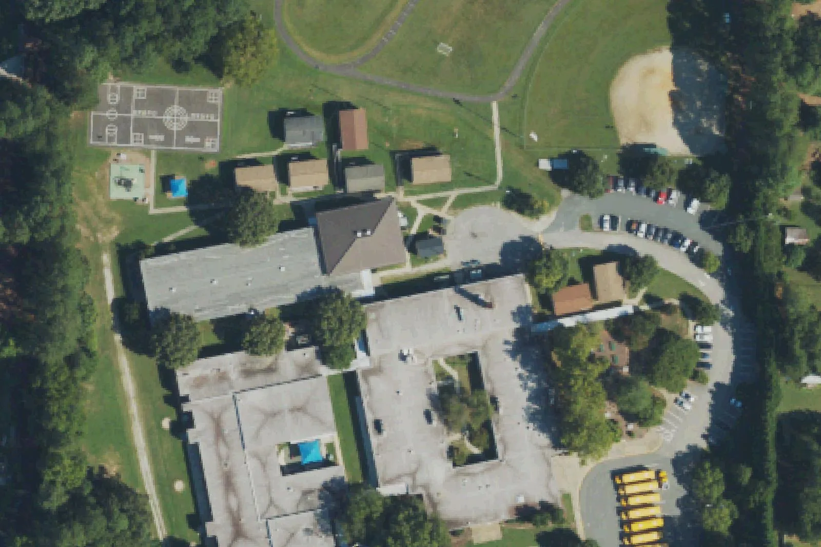 Baucom Elementary School's buildings and playground on Hunter Street in Apex, seen from the air