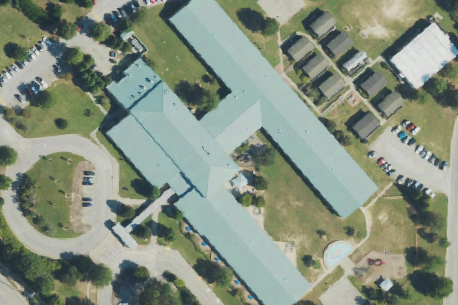 Salem Elementary School's long wings and mobile classrooms on Old Jenks Road in Apex, seen from the air